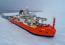 A red icebreaker ship cuts a swathe through ice RSV Nuyina is the Australian Antarctic Program's platform for supporting marine and atmospheric science Photo: Pete Harmsen